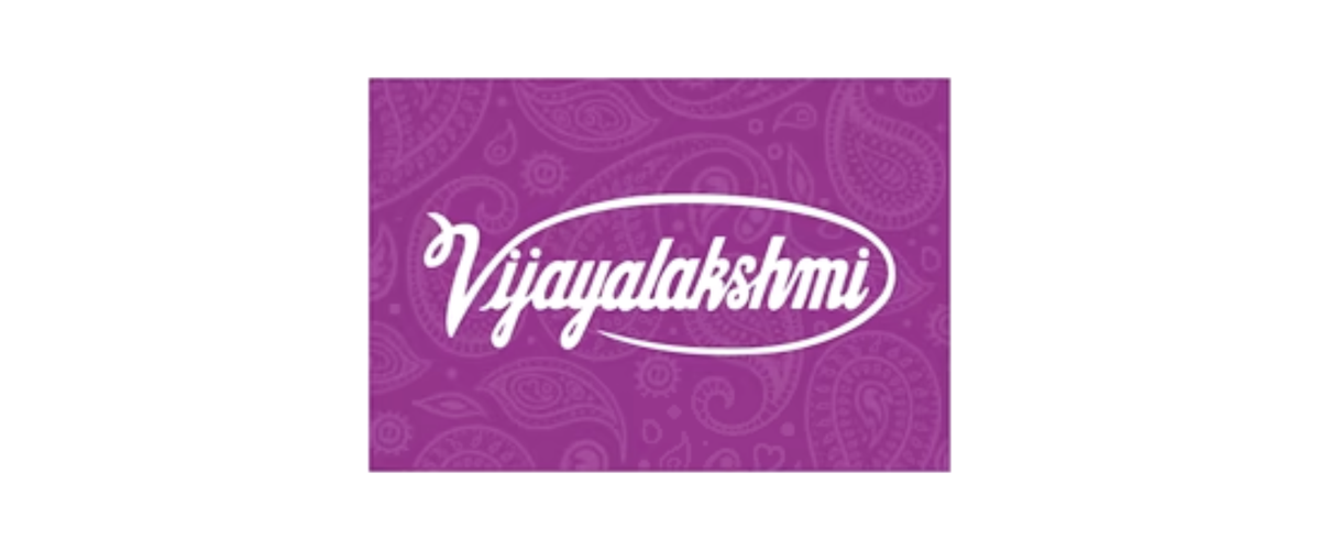 Vijayalakshmi white script on purple paisley block