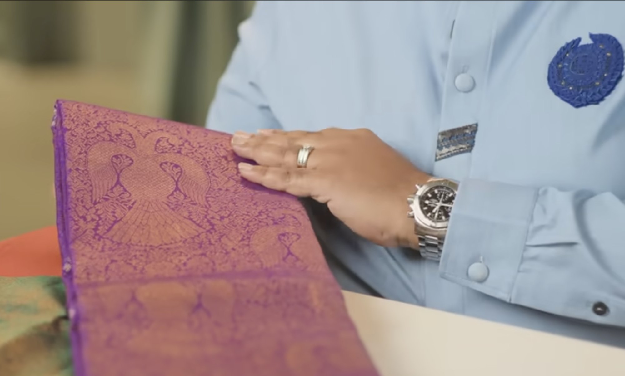 Hands on silk with zari border, from the 105th-year film